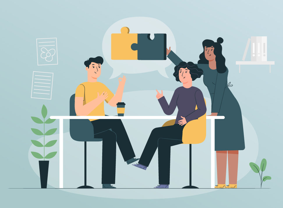 Ein Mann und eine Frai sitzen an einem kleinen weißen Tisch und unterhalten sich. Der Mann hat schwarze Haare, trägt ein gelbes T-Shirt und eine schwarze Hose. Die Frau hat ebenfalls schwarze Haare, trägt einen grauen Pullover und eine schwarze Hose. Neben den beiden steht eine Frau im grauen Kleid, die die Hand nach einer Sprechblase über den beiden am Tisch sitzenden ausstreckt. In der Sprechblase sind ein gelbes und ein schwarzes Puzzleteil zu sehen, die ineinandergesteckt sind. Die Illustration ist im Comicstil gehalten.